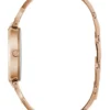 Analoog horloge in roségoudkleurige glans