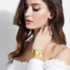 Analoog horloge met goudkleurige schakelband