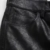 Broek van gekraakt leer