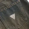 Denim broek met oogjes en lage taille