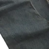 Denim broek met oogjes en lage taille