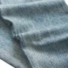 Denim broek met oogjes en lage taille