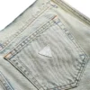 Denim broek met panelen en uitlopende pijpen