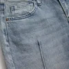 Denim broek met uitlopende pijpen Denim broek met uitlopende pijpen