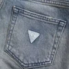Denim broek met uitlopende pijpen Denim broek met uitlopende pijpen