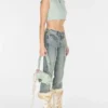 Denim broek met uitlopende pijpen Denim broek met uitlopende pijpen