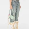 Denim broek met uitlopende pijpen Denim broek met uitlopende pijpen