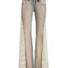 Denim broek met vetersluiting en uitlopende pijpen