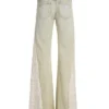 Denim broek met vetersluiting en uitlopende pijpen Denim broek met vetersluiting en uitlopende pijpen