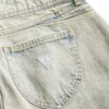 Denim broek met vetersluiting en uitlopende pijpen Denim broek met vetersluiting en uitlopende pijpen