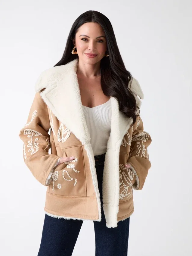 Eva-jas met borduursels Eva-jas met borduursels