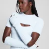 Gebreide jurk met losse mouwen en meteor-print Gebreide jurk met losse mouwen en meteor-print