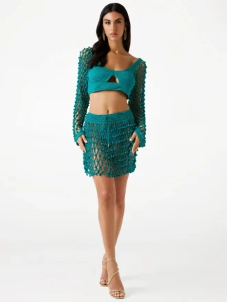 Gehaakte crop top met pompons