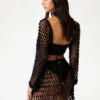 Gehaakte crop top met pompons