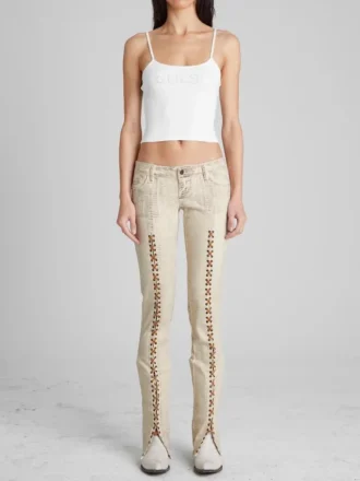 Denimjeans met vetersluiting en uitlopende pijpen