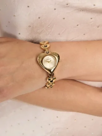 Goudkleurig analoog horloge met hart