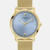 Goudkleurig en blauw analoog horloge