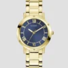 Goudkleurig en marineblauw rond analoog horloge Goudkleurig en marineblauw rond analoog horloge