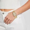 Goudkleurig multifunctioneel horloge met kristallen Goudkleurig multifunctioneel horloge met kristallen