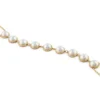 Goudkleurige bodyketting met imitatieparels