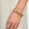 Goudkleurige Pava-schakelarmband