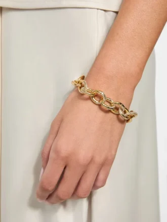 Goudkleurige Pava-schakelarmband