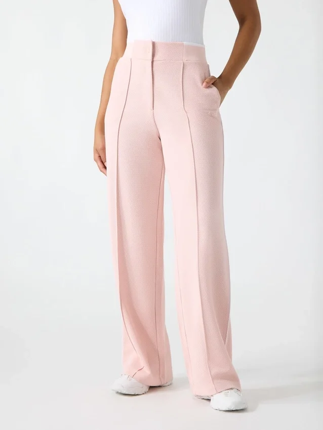 Joggingbroek met uitlopende pijpen Joggingbroek met uitlopende pijpen