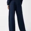 Joggingbroek met uitlopende pijpen Joggingbroek met uitlopende pijpen