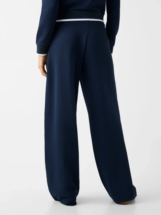 Joggingbroek met uitlopende pijpen Joggingbroek met uitlopende pijpen