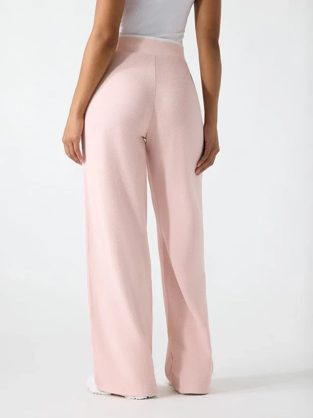 Joggingbroek met uitlopende pijpen Joggingbroek met uitlopende pijpen