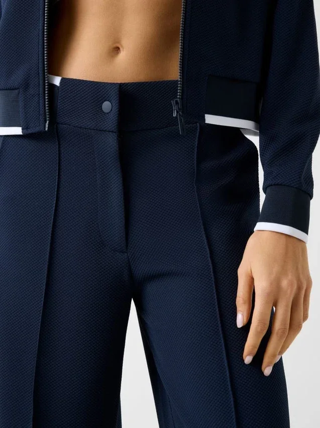 Joggingbroek met uitlopende pijpen Joggingbroek met uitlopende pijpen