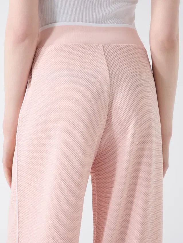 Joggingbroek met uitlopende pijpen Joggingbroek met uitlopende pijpen