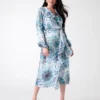Mina gewikkelde jurk met print Mina gewikkelde jurk met print