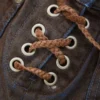 Rechte denim broek met vetersluiting Rechte denim broek met vetersluiting