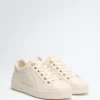 Ronii lage sneakers met pioenroos in reliëf