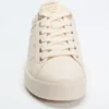 Ronii lage sneakers met pioenroos in reliëf