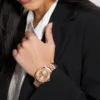 Roségoudkleurig en kristallen multifunctioneel horloge Roségoudkleurig en kristallen multifunctioneel horloge