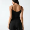 Top met ribgebreid patroon Top met ribgebreid patroon