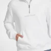 Trui met halve rits en logo Trui met halve rits en logo