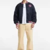 Varsity-jas met geborduurde patch Varsity-jas met geborduurde patch