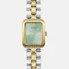 Zilver- en goudkleurig analoog horloge Zilver- en goudkleurig analoog horloge
