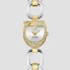 Zilver- en goudkleurig analoog horloge