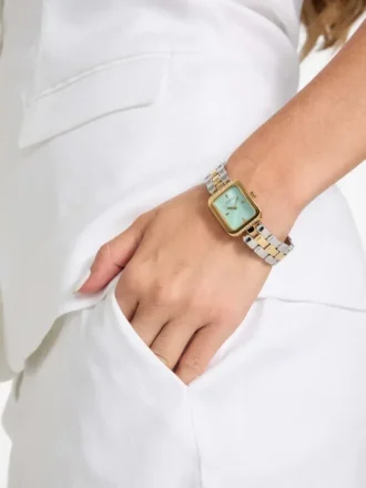 Zilver- en goudkleurig analoog horloge