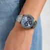 Zilverkleurig en blauw multifunctioneel horloge Zilverkleurig en blauw multifunctioneel horloge